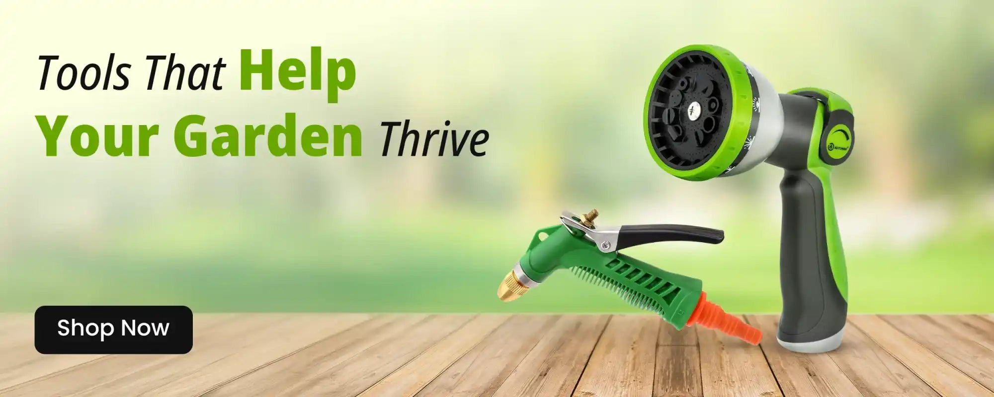 Two green and black garden hose nozzles.