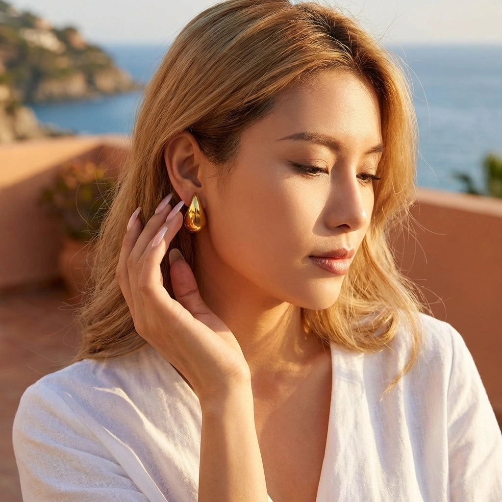 Gold Teardrop Statement Earrings